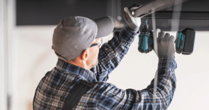Blog 11 man fixing limit switch on garage door
